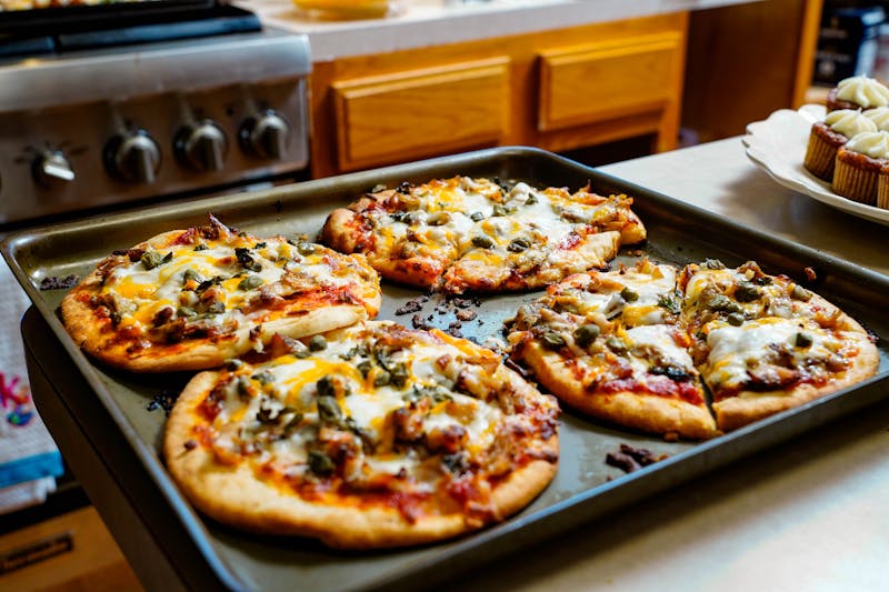 Four Cheese marcos pizza with truffle drizzle